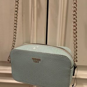 A brand new GUESS purse